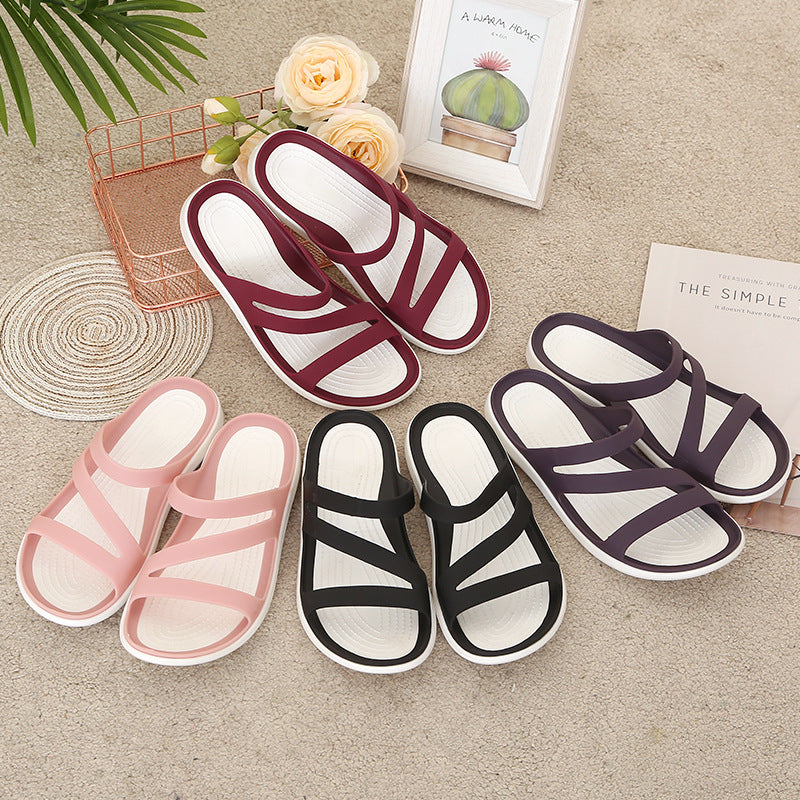 Verano transfronterizo nuevas zapatillas frías de fondo plano zapatos de playa junto al mar versión coreana zapatillas planas casuales para mujer
