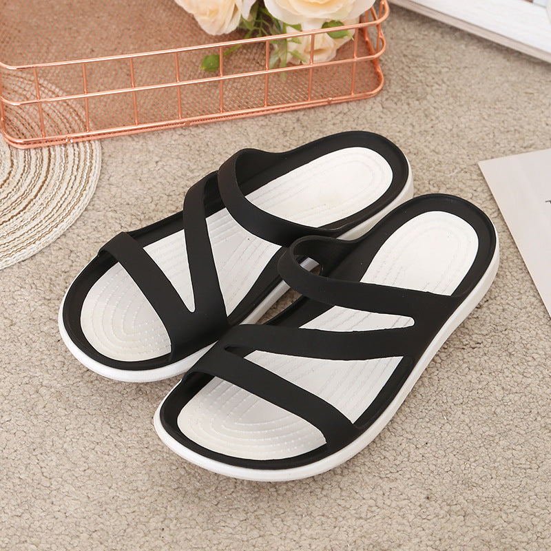 Verano transfronterizo nuevas zapatillas frías de fondo plano zapatos de playa junto al mar versión coreana zapatillas planas casuales para mujer