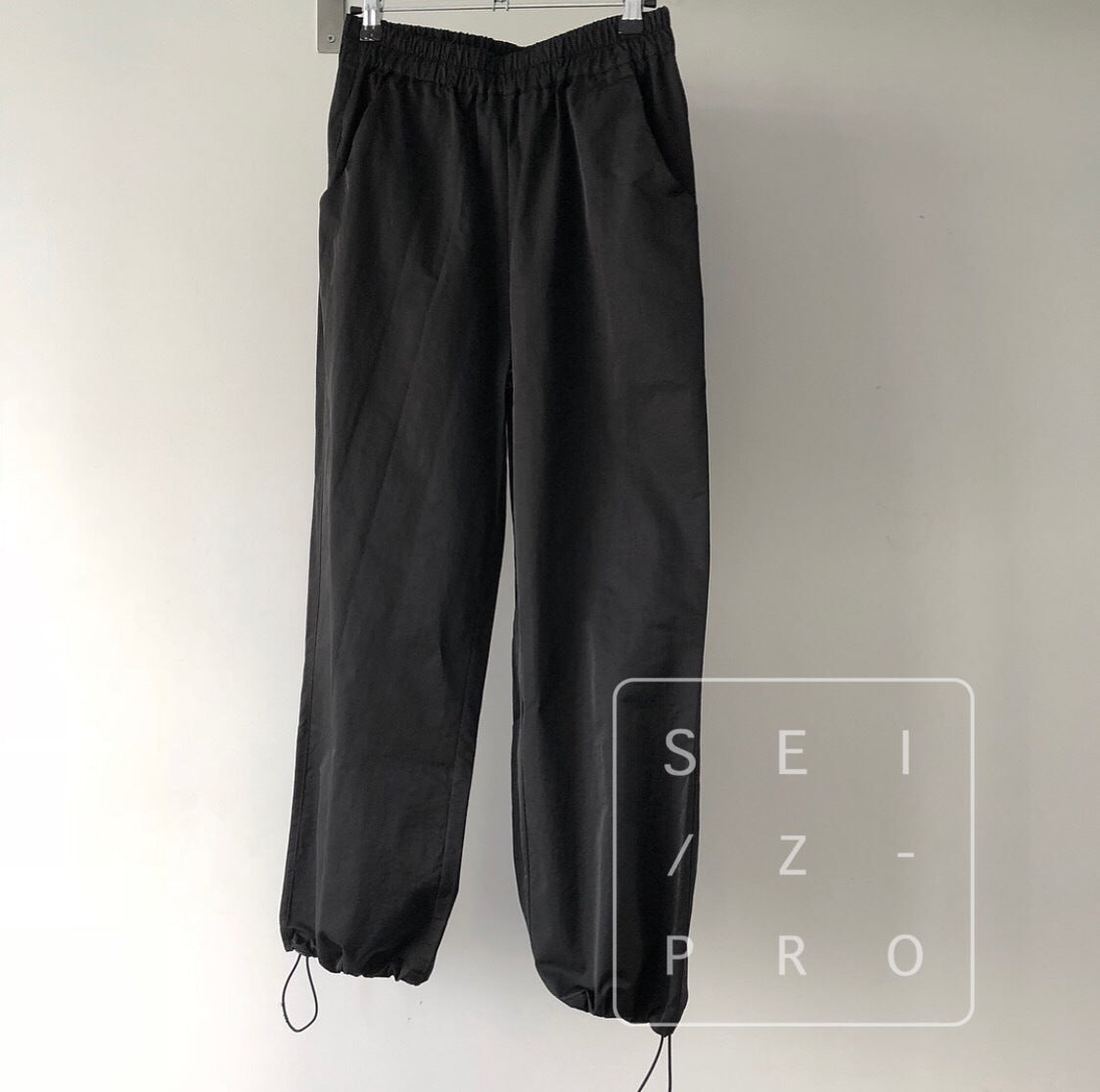 pantalones de ramo Canción plisada suelta pantalones casuales de pierna ancha marea sección delgada nueve pantalones mujeres